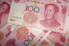 Chinese yuan falls to weakest level against dollar since 2010