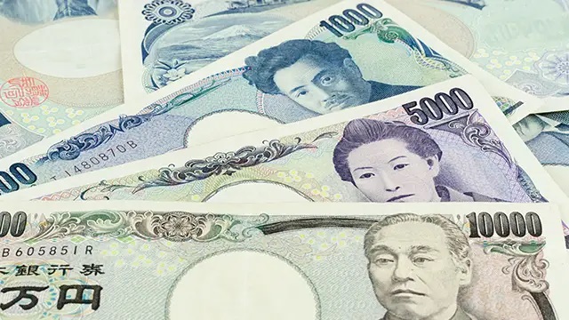 Yen weakens after BOJ holds policy, dollar steady