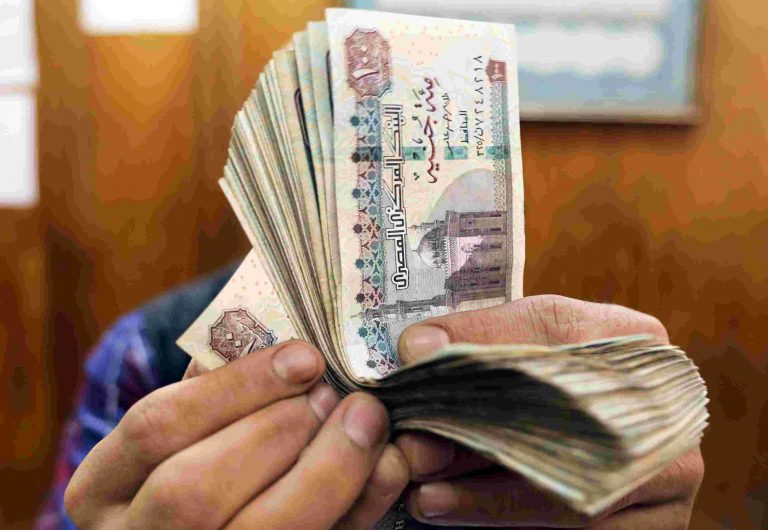 Egypt devalues currency by 35% after big rate hike